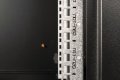 Szafa sieciowa wisząca Unique 19" 12U rack 600x450, drzwi szyba, czarny, niedzielona, złożona, 100kg